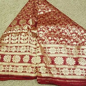 Red Saree with Gold Embellishment.
